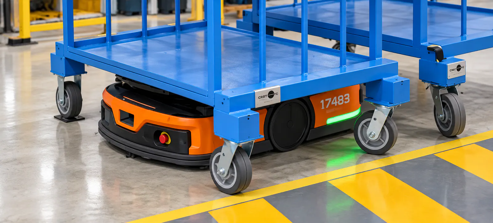Robot móvil transportando componentes para una línea de fabricación de electrodomésticos