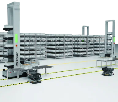 AMR bajo carga transportando contenedores en un sistema automatizado